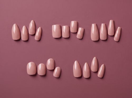 Nude press-on nails in five shapes on a mauve background