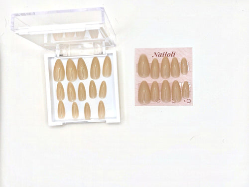 Open Nailoli case holding spare nude almond press-on nails next to a Nailoli card with a set of ten