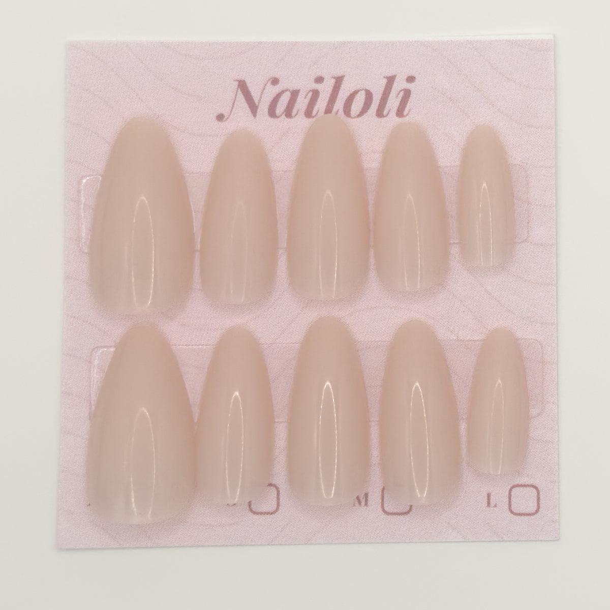 Pack of beige nail extensions with 'Nailoli' branding on a pink background