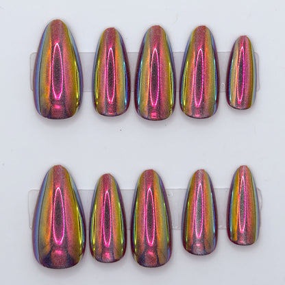 Set of eight multicolored nail extensions on a white background