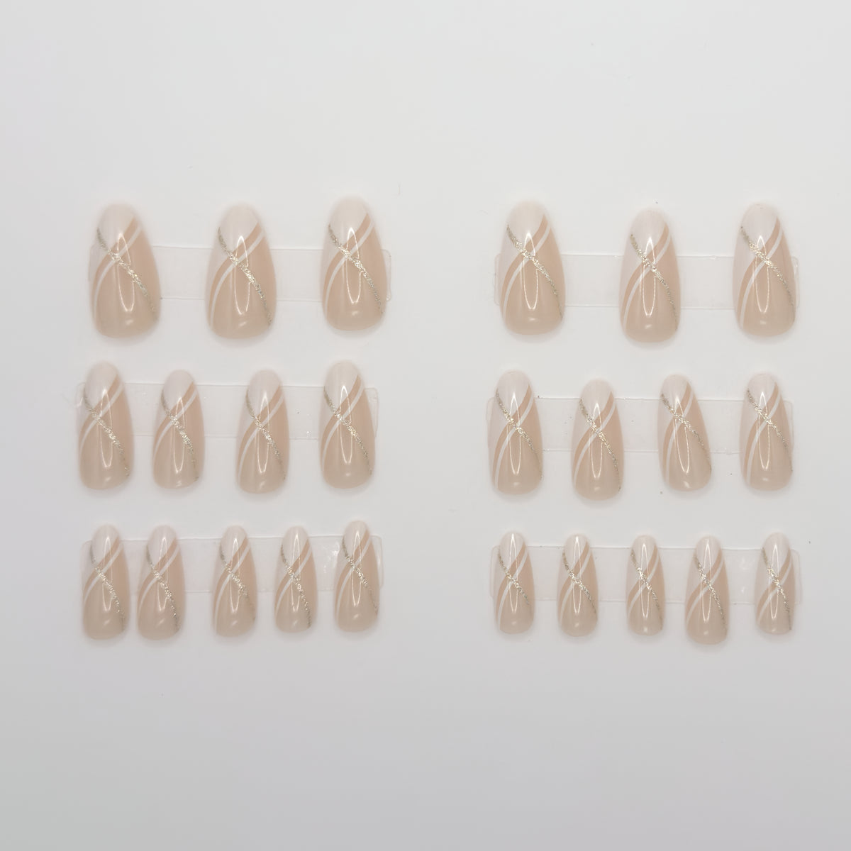 Set of beige nail art designs on a white background