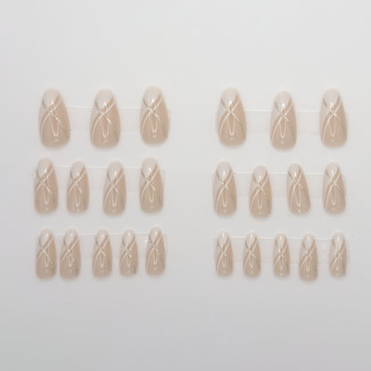 Set of beige nail art designs on a white background