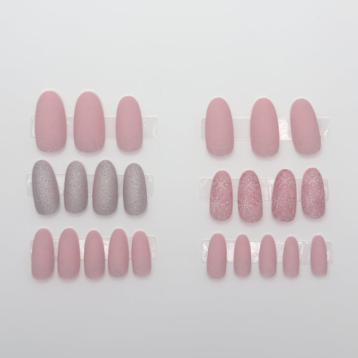 Set of pink and gray nail art designs on a white background