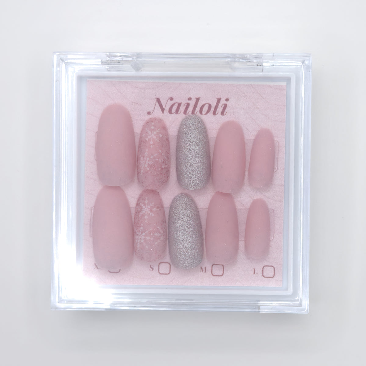 Set of pink and silver press-on nails in a clear box with 'Nailoli' branding.