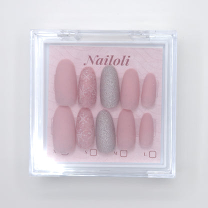 Set of pink and silver press-on nails in a clear box with 'Nailoli' branding.