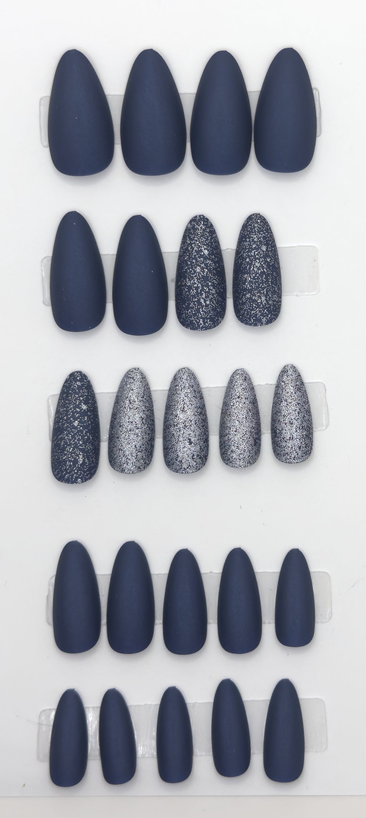 Full midnight navy set laid out in rows from largest to smallest size