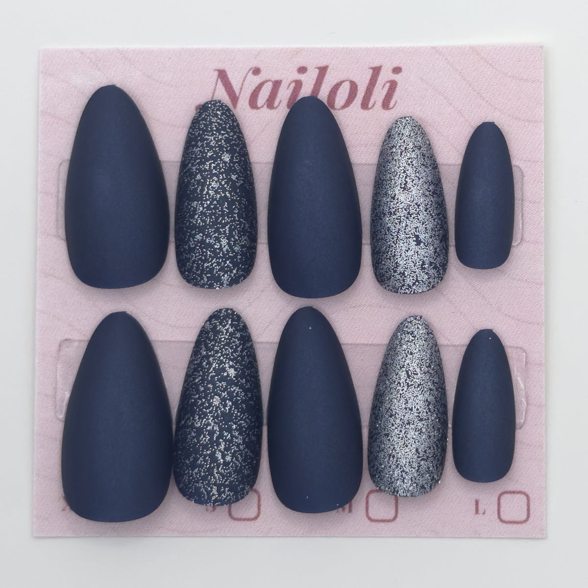 Midnight navy nails on the pink Nailoli backing card