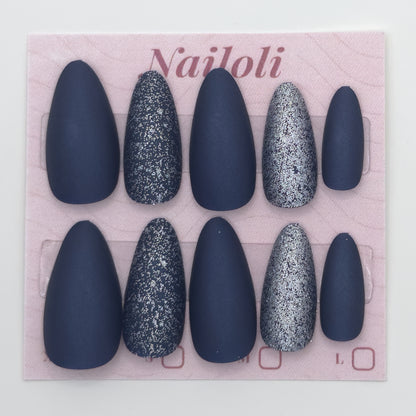Midnight navy nails on the pink Nailoli backing card