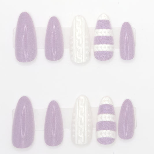 Set of lavender and white nail art designs on a white background
