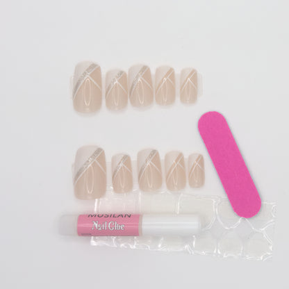 Set of beige nail extensions with a pink nail file and bottle of nail glue on a white background