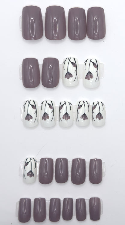 Full taupe floral set laid out in rows from largest to smallest size