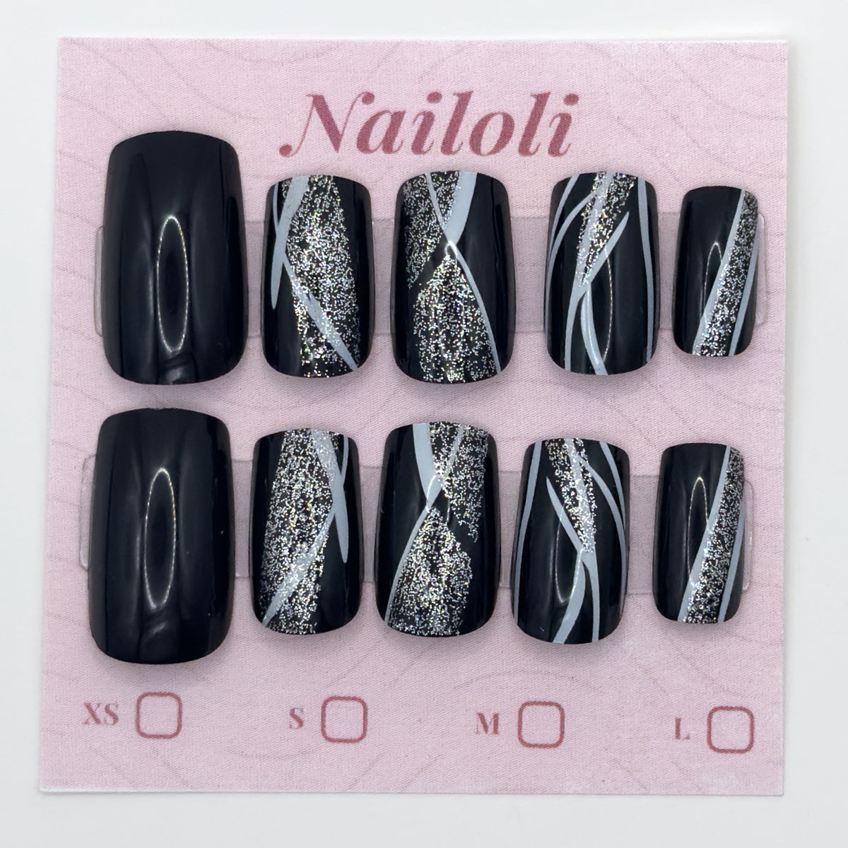 Glossy black nails on the pink Nailoli backing card with XS, S, M, and L size boxes
