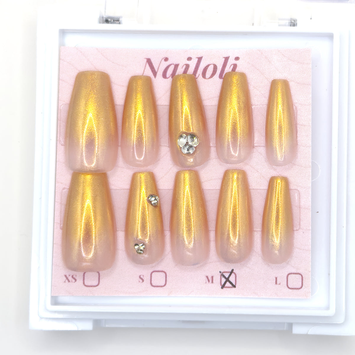 Champagne gold set inside the closed clear Nailoli case
