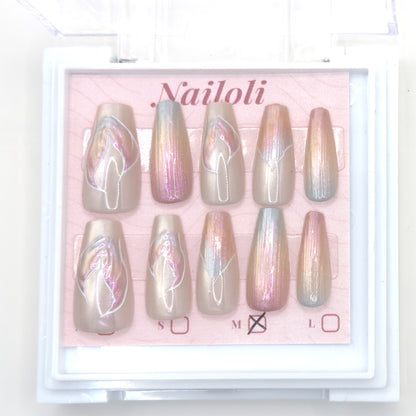 Pearl aurora set on its backing card inside the open clear Nailoli case