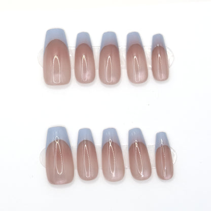 10 sheer blush coffin press-ons in two rows with powder blue French tips