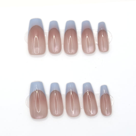 10 sheer blush coffin press-ons in two rows with powder blue French tips