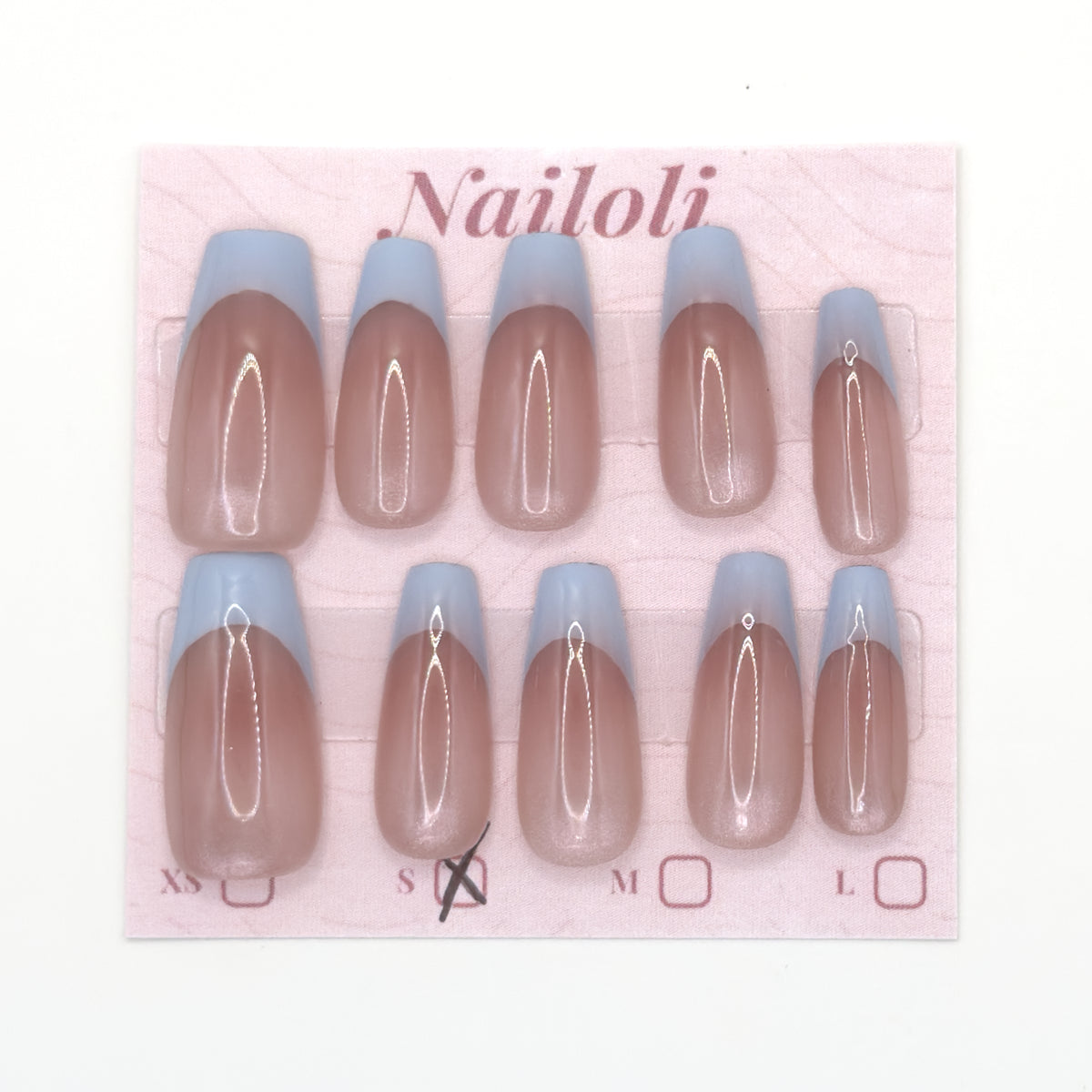 Powder blue French tip nails on the pink Nailoli backing card