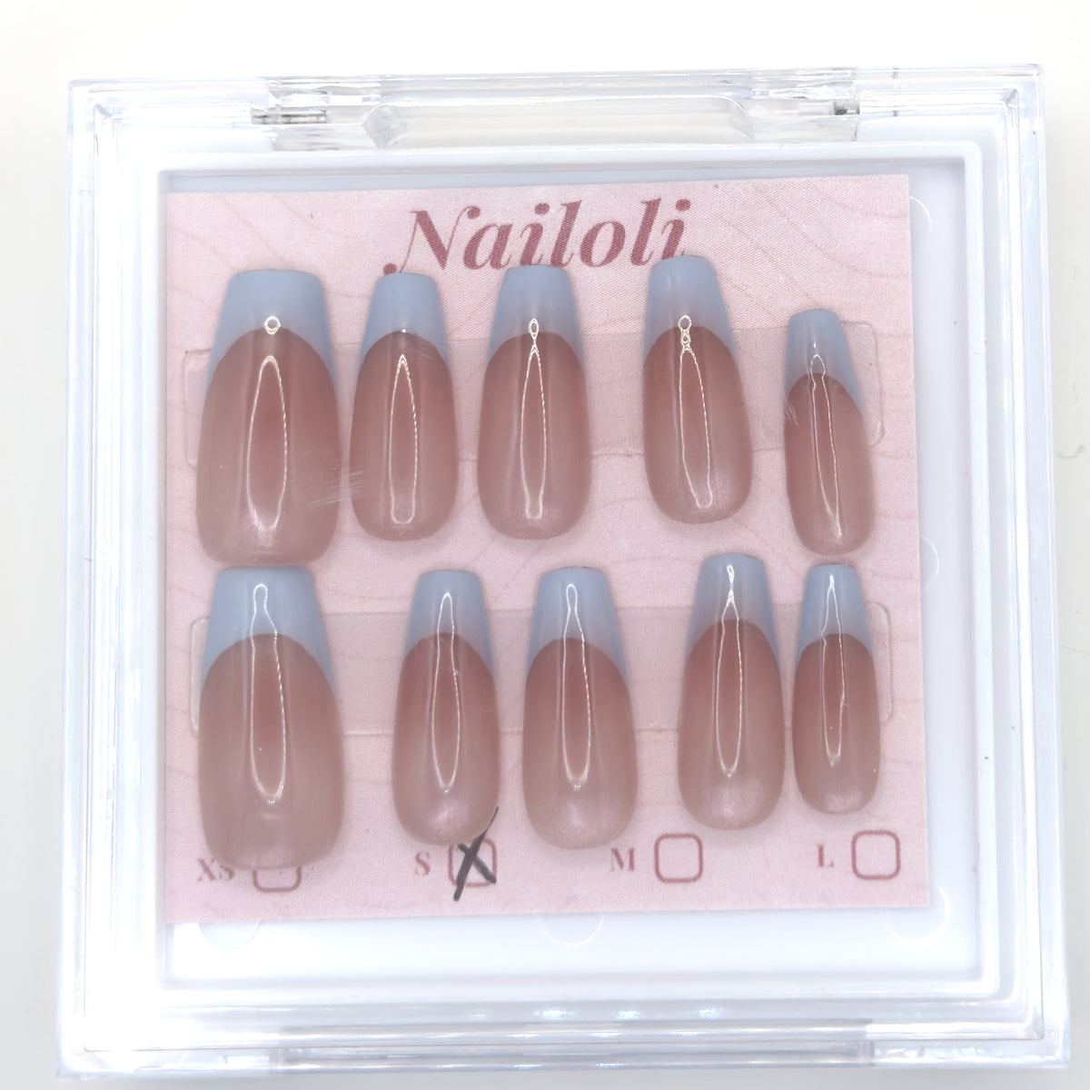 Powder blue French set inside the closed clear Nailoli case