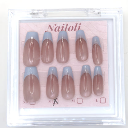 Powder blue French set inside the closed clear Nailoli case