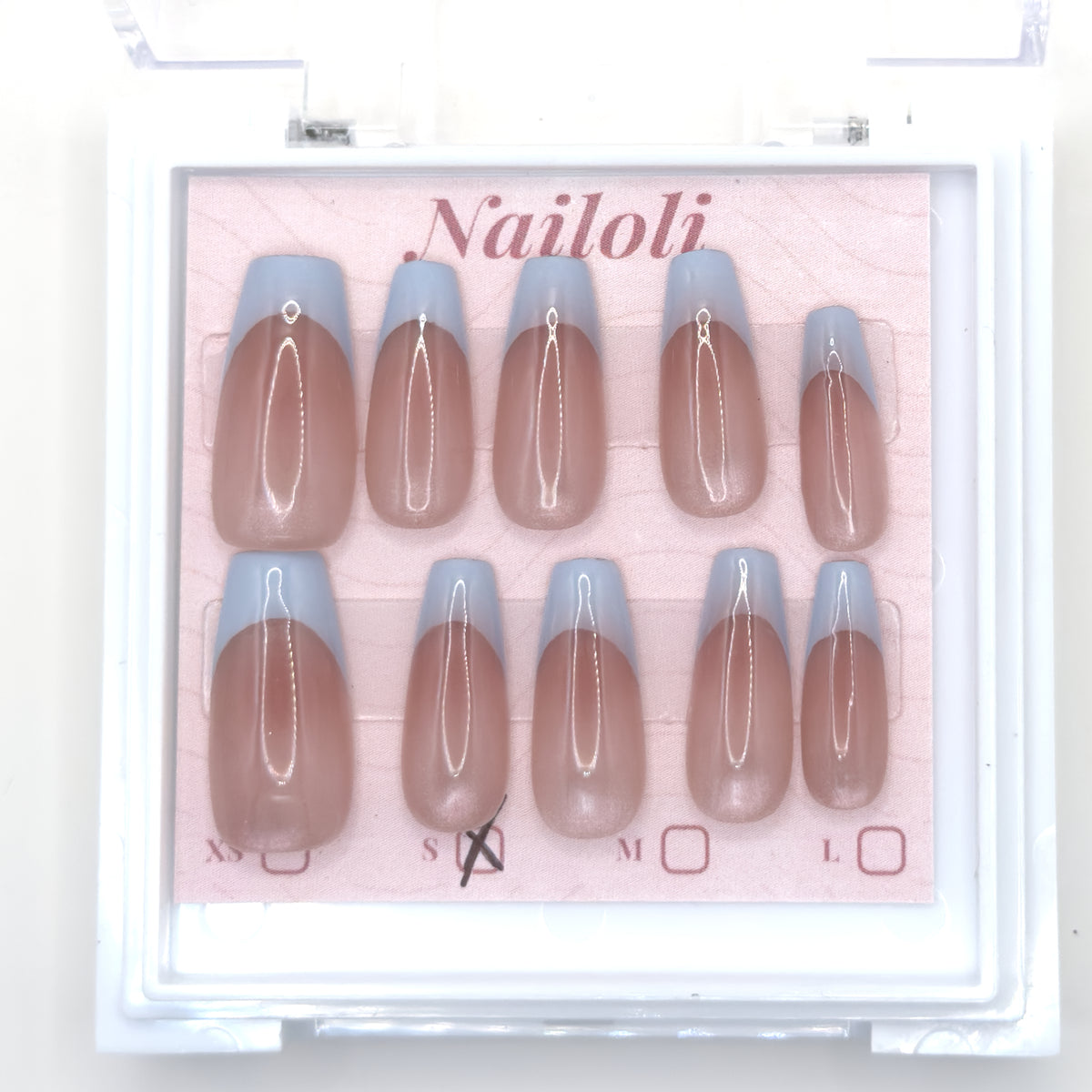 Powder blue French set on its backing card inside the open clear Nailoli case