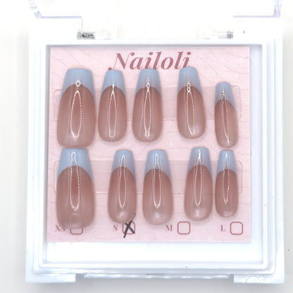 Powder blue French set on its backing card inside the open clear Nailoli case