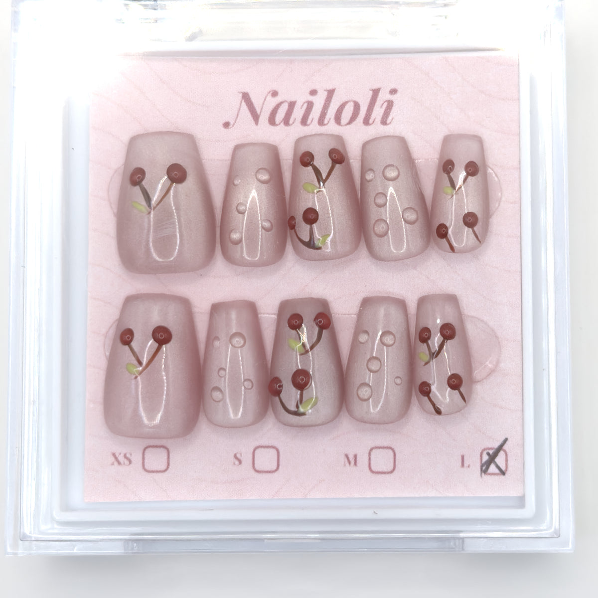 Cherry blush set on its backing card in the clear Nailoli case
