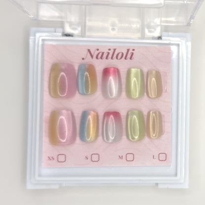 Pastel chrome set on its backing card inside the open clear Nailoli case