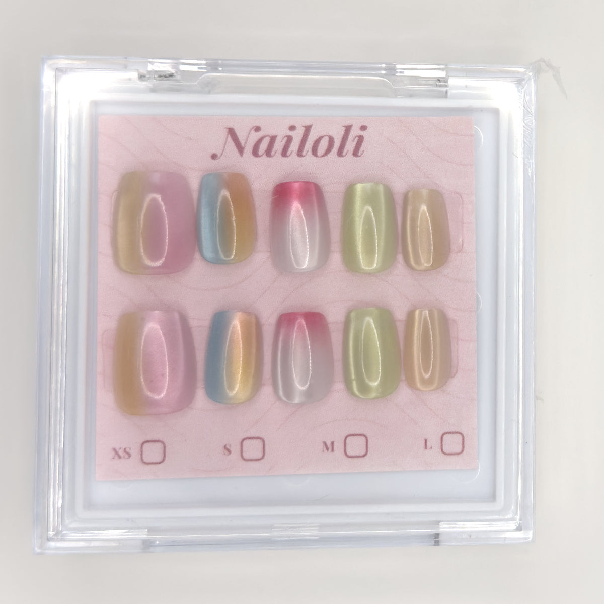 Pastel chrome set inside the closed clear Nailoli case