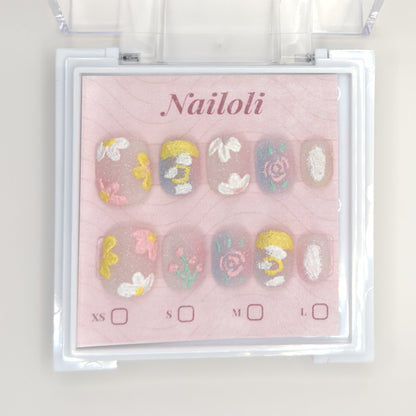 Milky pastel set on its backing card inside the open clear Nailoli case