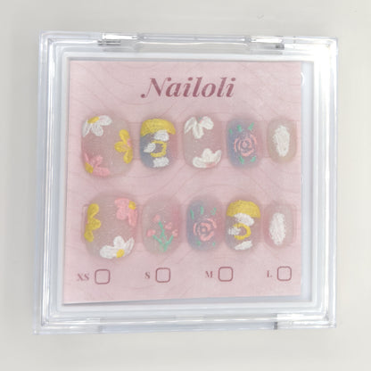 Milky pastel set inside the closed clear Nailoli case