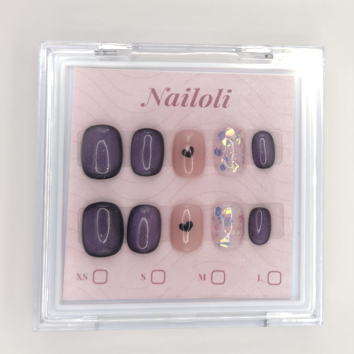 Velvet plum set inside the closed clear Nailoli case