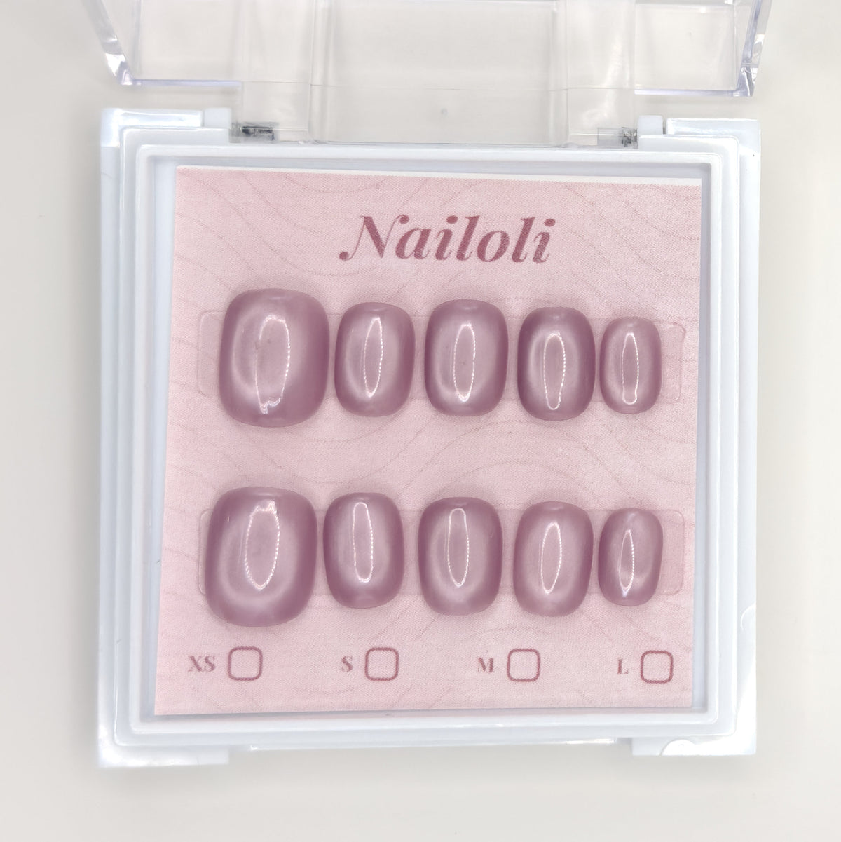 Dusty mauve set on its backing card inside the open clear Nailoli case
