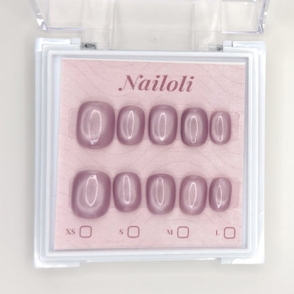 Dusty mauve set on its backing card inside the open clear Nailoli case