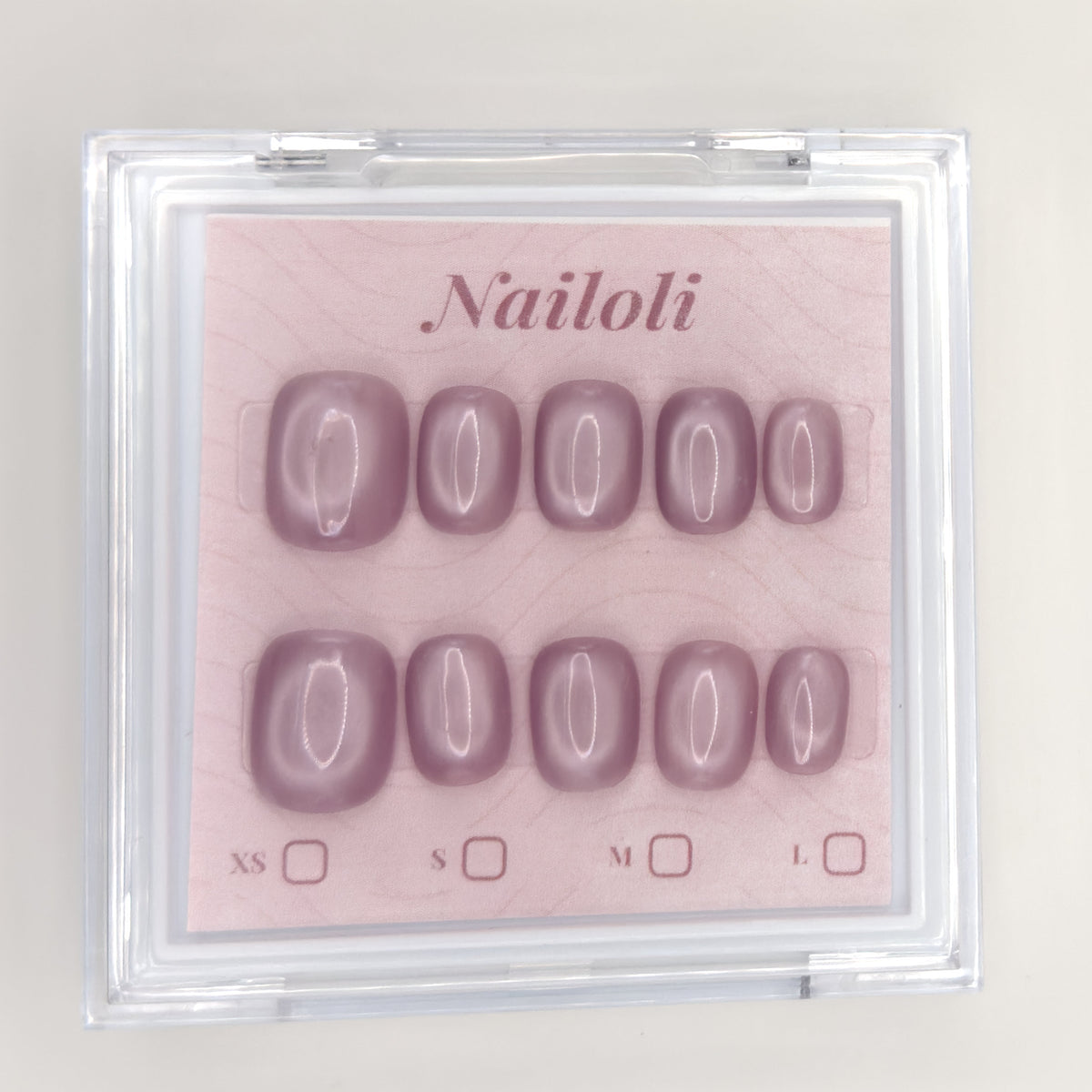 Dusty mauve set inside the closed clear Nailoli case