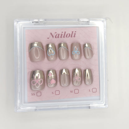 Champagne chrome set inside the closed clear Nailoli case