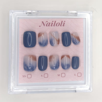 Ocean marble set on its backing card inside the closed clear Nailoli case